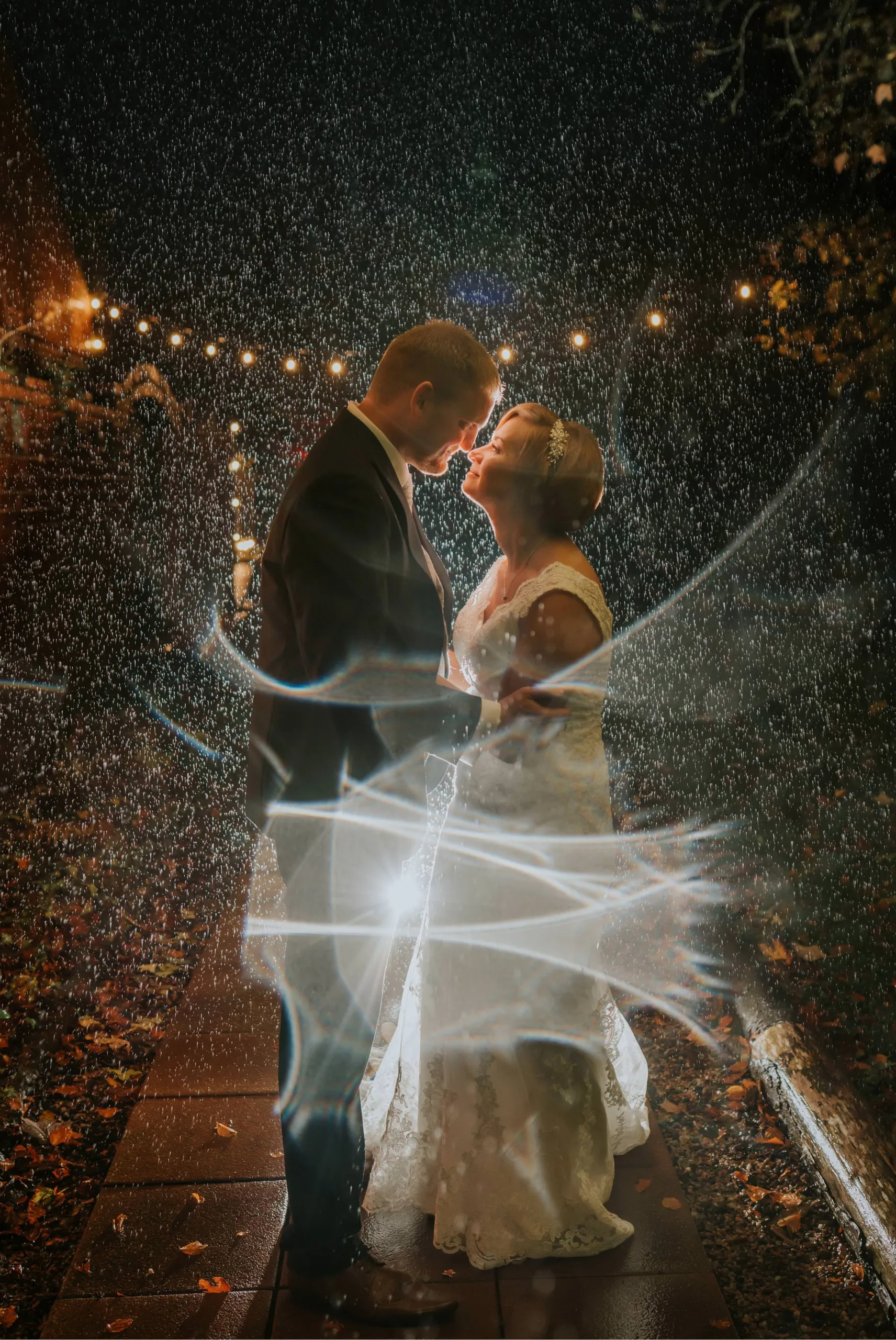epic wedding photo in the rain at the wooltower