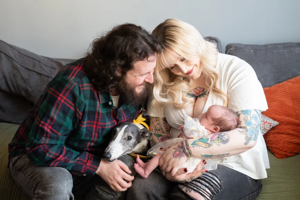 mum & dad doting over their much loved little girl