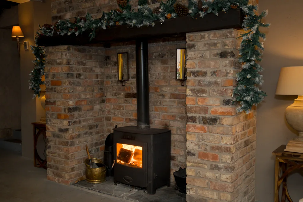stove inside the barn in the old coach house barn at Hillmount House